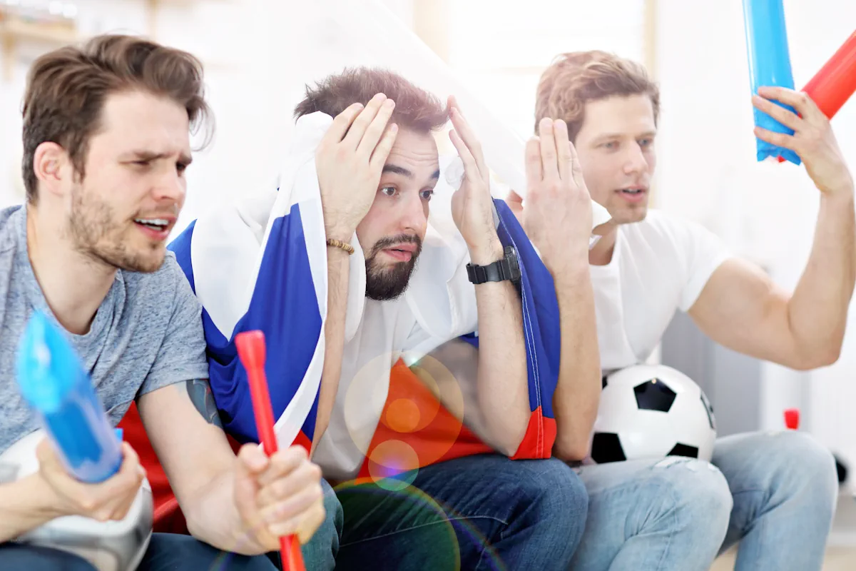 Des Fans d'une équipe qui perd