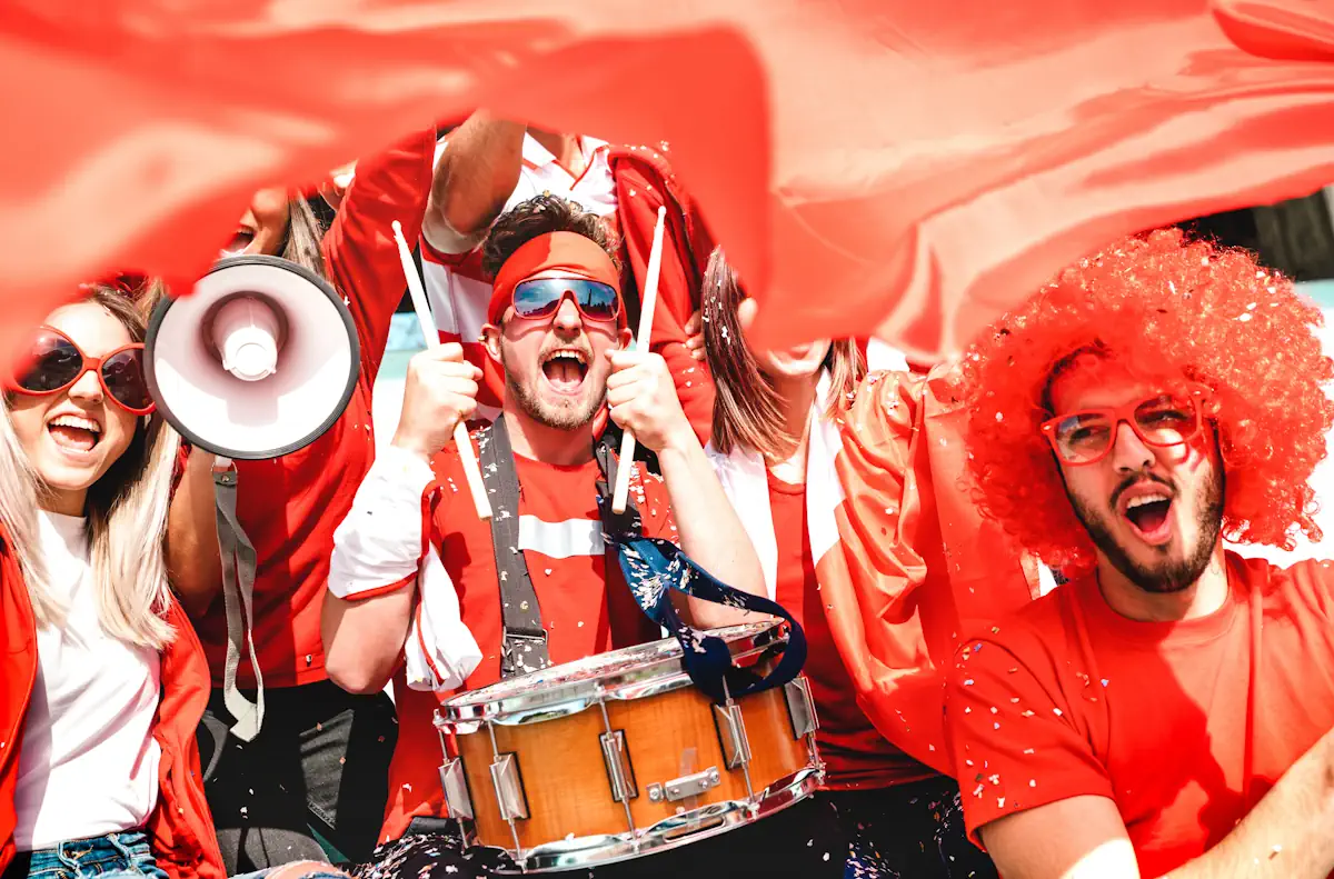 fan d'équipes dans une voiture pour aller voir un match